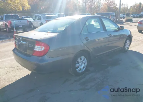 2004 Toyota Camry Le z USA, uszkodzony, nr VIN 4T1BE32K14U850479